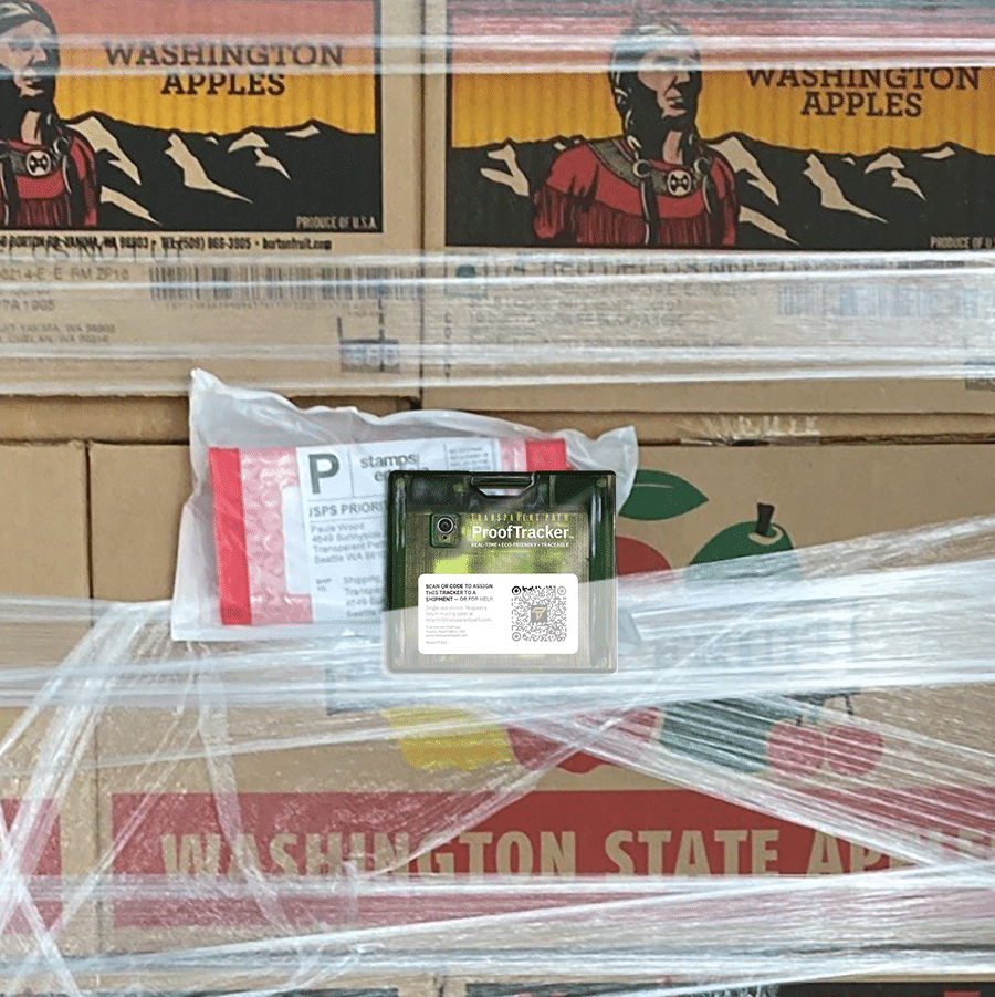 Image of a ProofTracker affixed to a pallet of apples